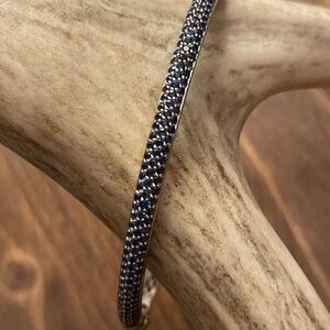 Sapphire pave bangle with 18 kt white gold
